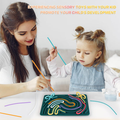 Busy board featuring zippers buttons switches and sensory activities