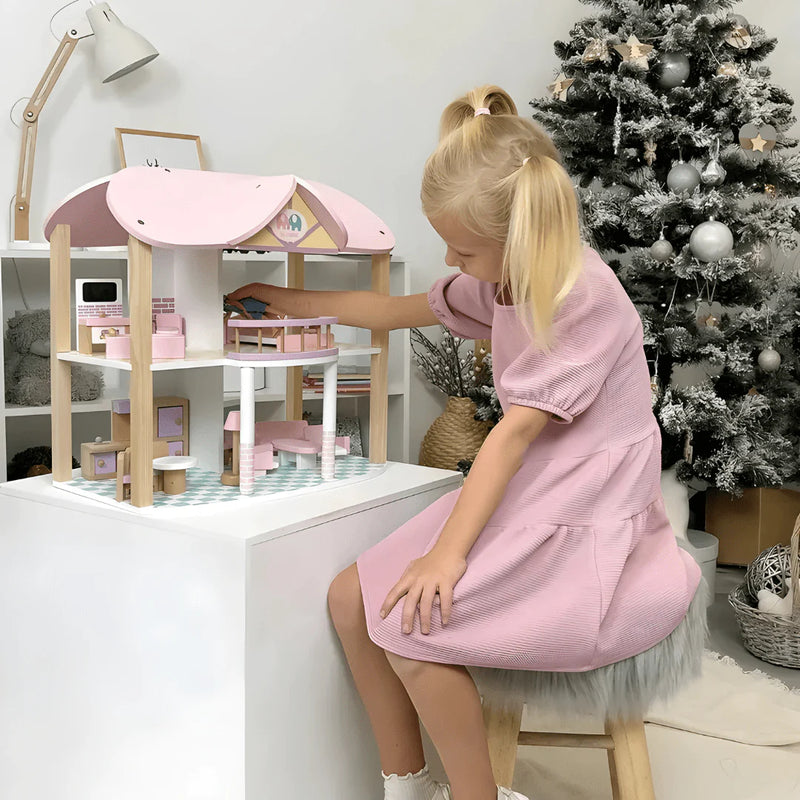 Wooden dollhouse with bedroom and living room furniture