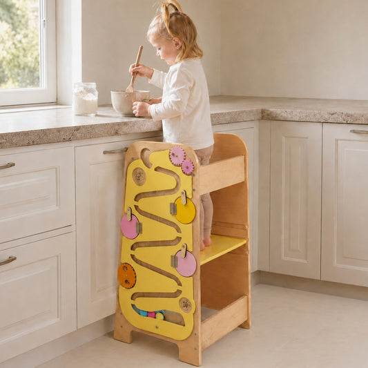 5-in-1 Montessori learning tower helping toddlers participate in kitchen activities