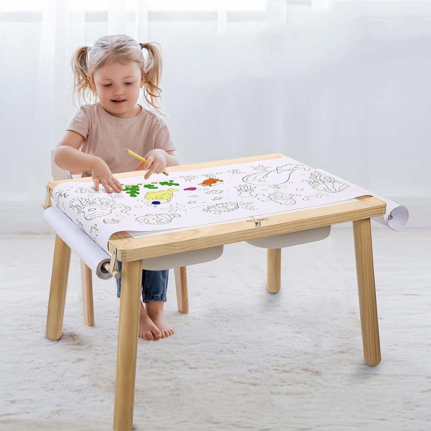 Montessori playroom table for sensory and creative activities
