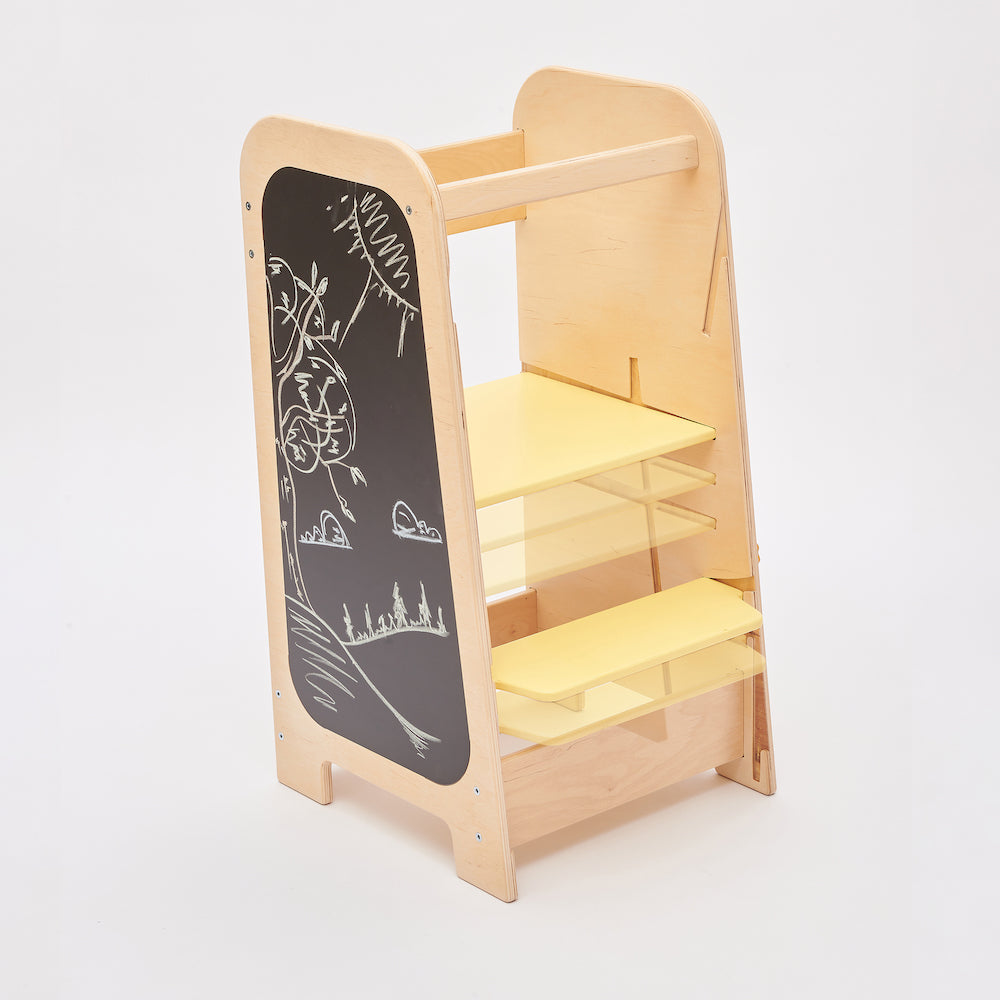 Montessori learning tower converted into a child-size activity desk