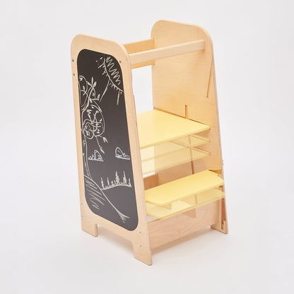 Montessori learning tower converted into a child-size activity desk