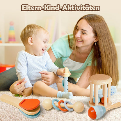 Toddler playing wooden maracas as part of Montessori musical toy set