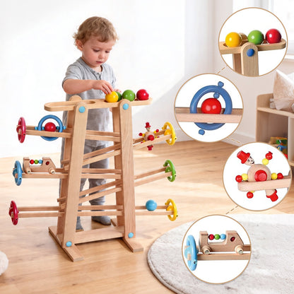 Toddler playing with Montessori wooden marble run toy at home