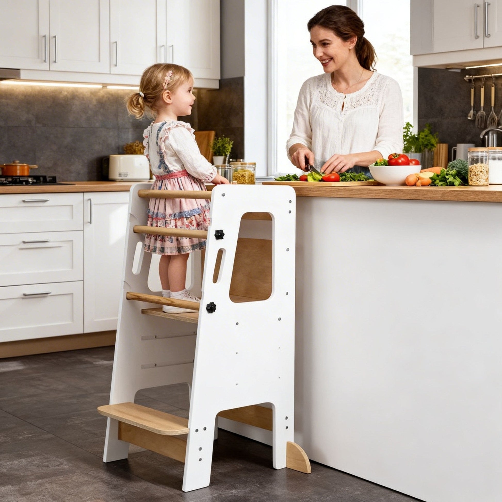 White kitchen helper tower for kids to safely join cooking and kitchen tasks