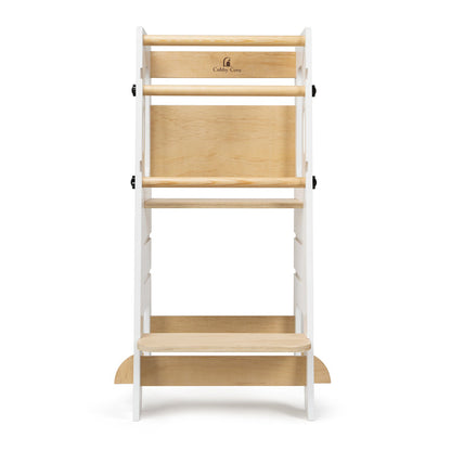 White learning tower for toddlers to wash hands independently at the sink
