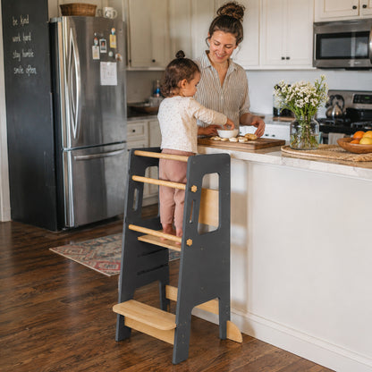 Learning tower safety rail