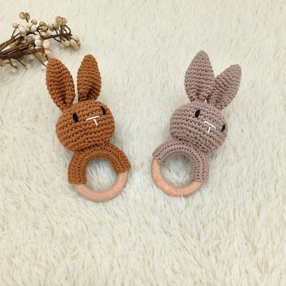 Wooden teether toy for soothing baby's sore gums